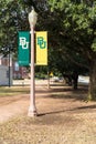 Baylor University banners on light poles, with copy space