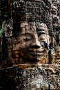 The Bayon is a temple at Angkor in Cambodia with the huge faces of Jayavarman
