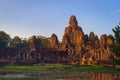 Bayon temple, located in Angkor, Cambodia, the ancient capital city of the Khmer empire. General exterior view from the southwest Royalty Free Stock Photo