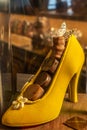 Bayonne, France. 29.06.2020. Chocolate handmade yellow shoes on yellow background