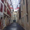 Bayonne, France: Umbrella art instalment in Rue Marsan, Bayonne, Aquitane Royalty Free Stock Photo