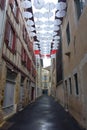 Bayonne, France: Umbrella art instalment in Rue Marsan, Bayonne, Aquitane Royalty Free Stock Photo