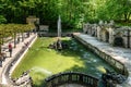 Bayreuth, Germany - May 18, 2023: Fountain in the Low Grotto pond in the Historical Hermitage at Bayreuth, Germany