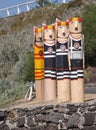 The Baywalk Bollards mid-1990s which reflect local history were created with old timber and piles from a city pier