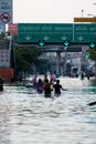 BBangkok,Thailand, Oct,30.2011:Bangkok,Thailand, Oct,28.2011: Flooding in Thailand, traffic has to use boats on the road instead