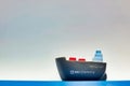 BBC Chartering toy ship sailing across the ocean. Royalty Free Stock Photo