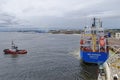 The BBC Marmara general Cargo Vessel being towed away from the Quay at Port Gentil Royalty Free Stock Photo