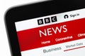 BBC News logo website on display notebook closeup