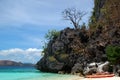 BBH beach water sand, dock boat, and trees Royalty Free Stock Photo