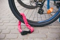 Bicycle lock. Bicycle lock near the bike. Cycling park Royalty Free Stock Photo