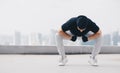 Bboy doing some stunts. Street artist breakdancing outdoors Royalty Free Stock Photo