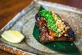 BBQ beef ribs with  glazing and peanuts and chopped spring onions Royalty Free Stock Photo