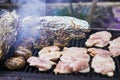 BBQ burgers, grilled chicken legs BBQ smoke party. Close-up Royalty Free Stock Photo