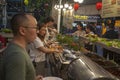 BBQ cafe, sea food, cooking seafood on a barbecue, shrimps, oysters, frog legs, squids, close-up