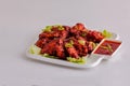 BBQ Chicken Hot & Spicy Wings with green chillis & lecttus