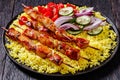 Bbq chicken kebabs with saffron rice and veggies Royalty Free Stock Photo