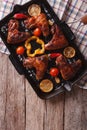 BBQ chicken wings with vegetables in a pan grill. vertical top v Royalty Free Stock Photo