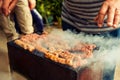 BBQ. Closeup of barbecue grilling picnic in backyard outdoor Royalty Free Stock Photo