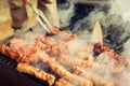 BBQ. Closeup of barbecue grilling picnic in backyard outdoor Royalty Free Stock Photo