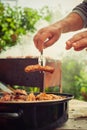 BBQ. Closeup of barbecue grilling picnic in backyard outdoor Royalty Free Stock Photo