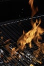 BBQ fire and grill with flames close up before cooking on charcoal Royalty Free Stock Photo