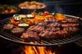 BBQ grill closeup with mouthwatering grilled meat and vegetables