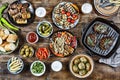 BBQ, grill, Dinner table, meat grill, new potatoes, salads, light beer Royalty Free Stock Photo