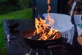 Bbq grill flame, hot burning grill outdoors cooking food. Grill burning fire for barbecue cooking outdoors. Royalty Free Stock Photo