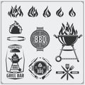 BBQ and grill labels set. Barbecue emblems, badges and design elements. Vector monochrome illustration.