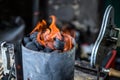 BBQ Grill Pit Glowing And Flames Hot Charcoal Briquettes coal Food Background Or Texture Close-Up Top View Royalty Free Stock Photo