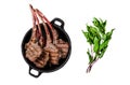 BBq Grilled lamb mutton chops steaks in a pan. Isolated on white background, top view. Royalty Free Stock Photo