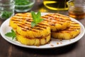 bbq grilled pineapple slices on a dish