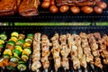 BBQ with kebab cooking coal grill of chicken meat skewers with mushroom and peppers barbecuing dinner Royalty Free Stock Photo