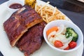 BBQ marinated spareribs and fries