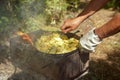 BBQ picnic. Relax on the campsite, cooking juicy fried potatoes