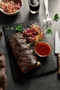 Bbq pork ribs on black slate plate Royalty Free Stock Photo