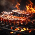 bbq pork ribs cooking on flaming grill. grilling baby back pork ribs over flaming grill Royalty Free Stock Photo