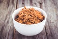 Bbq pulled pork bowl over a wooden plank table Royalty Free Stock Photo