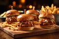 bbq pulled pork sliders with a side of fries