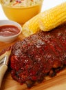 BBQ Ribs with cole slaw, corn and dipping sauce Royalty Free Stock Photo