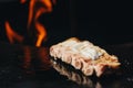 BBQ Roast Marinated Baby Back Pork Ribs Close-up On Hot Flaming Grill Background Royalty Free Stock Photo