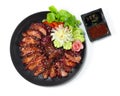 BBQ Roast Pork Hong Kong Red Pork Style Char Siu sprinkle with Sesame Juicy delicious Chinese Food Royalty Free Stock Photo