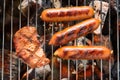 BBQ sausages and meat on the grill. Royalty Free Stock Photo