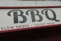 bbq slow smoke sweet meat caption text horizontal sign , black and red writing