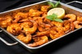 bbq spiced shrimps on a metallic tray