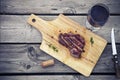 BBQ steak. Barbecue grilled beef steak meat with red wine and kn