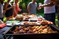 bbq themed picnic with people grilling wings