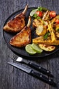 bbq tomahawk pork chop with corn and potatoes Royalty Free Stock Photo