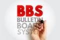 BBS Bulletin Board System acronym handwritten. Classic communication and information sharing concept related to online forums and Royalty Free Stock Photo