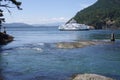 Ferry passing around navigation point Royalty Free Stock Photo